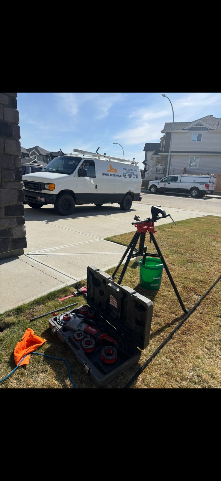 Sphinx Mechanical service van and tools on a job site in Edmonton